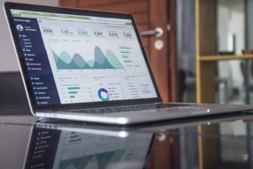 laptop monitoring sales dashboard