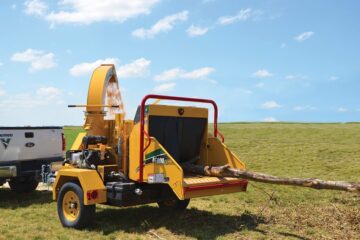 Vermeer wood chipper machine in action